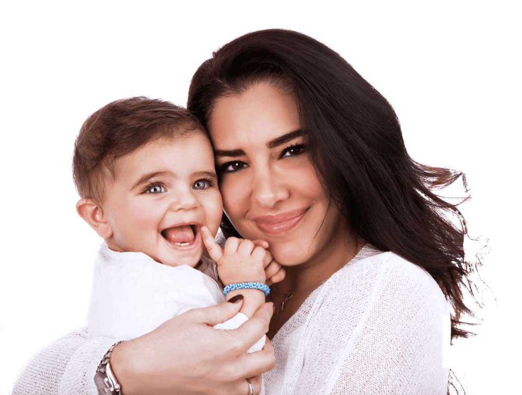 Hire a nanny from a local nanny agency, called Kensington Nanny. Photo shows a nanny holding a child in her arms, smiling.