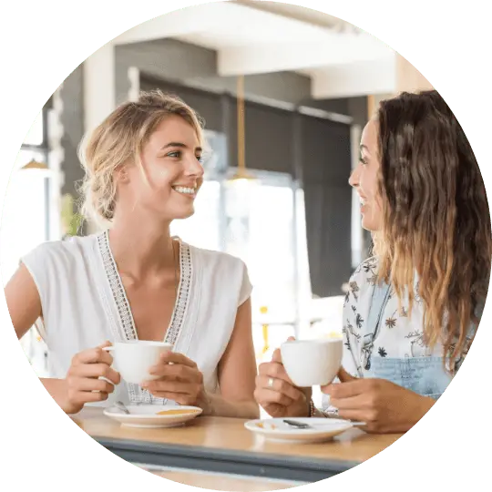 this image shows 2 women talking. they are recommending kensington nanny agency and leaving a nanny agency review.