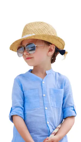 image shows child on boating vacation looking to the title of this webpage, which reads, "travel nanny service"